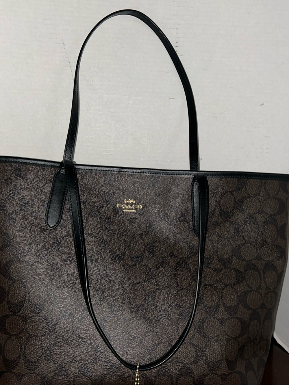 Coach Black & Brown Signature coated Canvas Tote with Black Trim. Gold hardware
